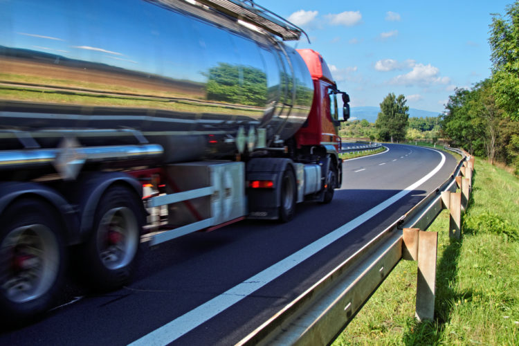 Common Distractions for Truck Drivers - Mirroring the landscape chrome tank truck